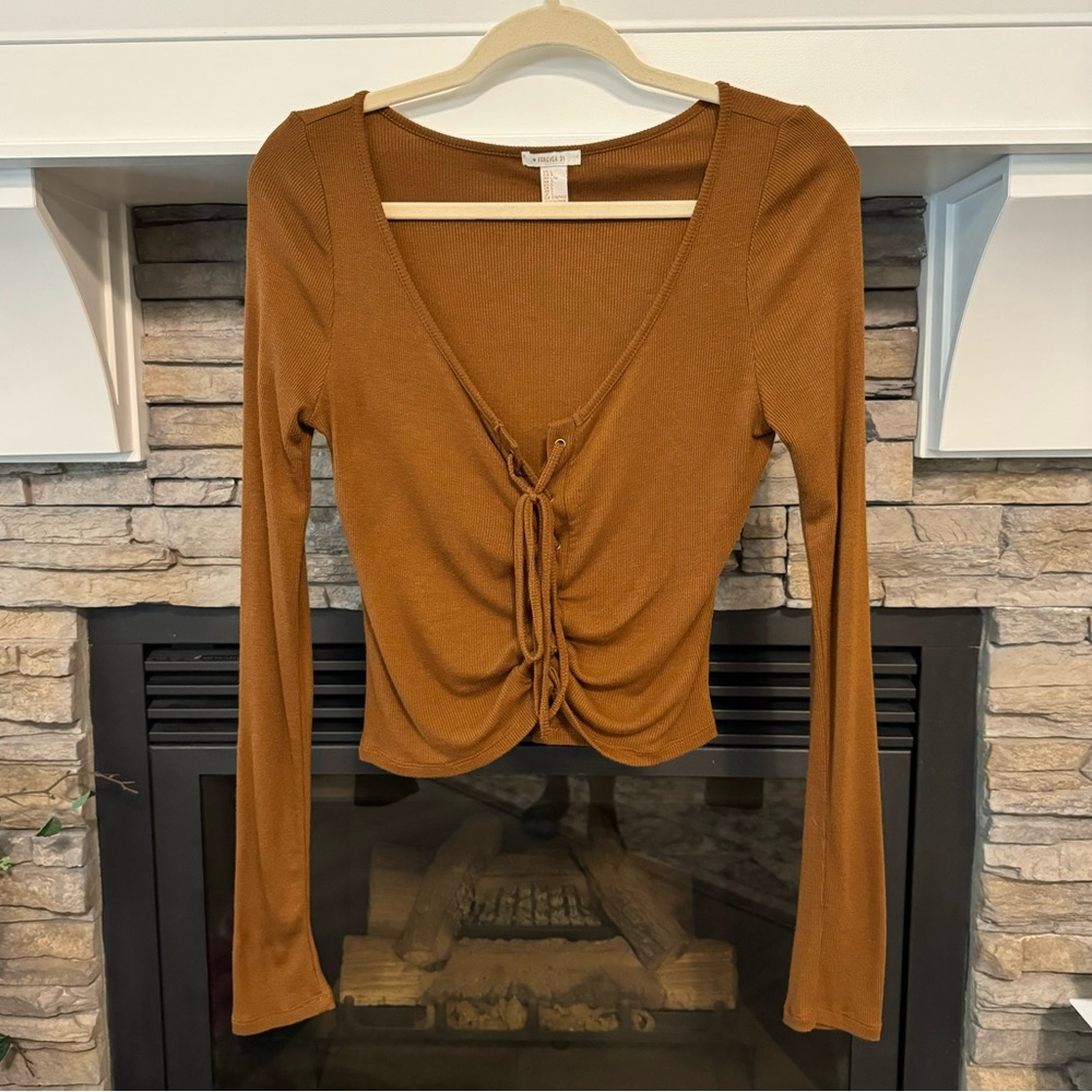 Forever 21 front laced up top, size Large.